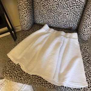 Short white A-line skirt